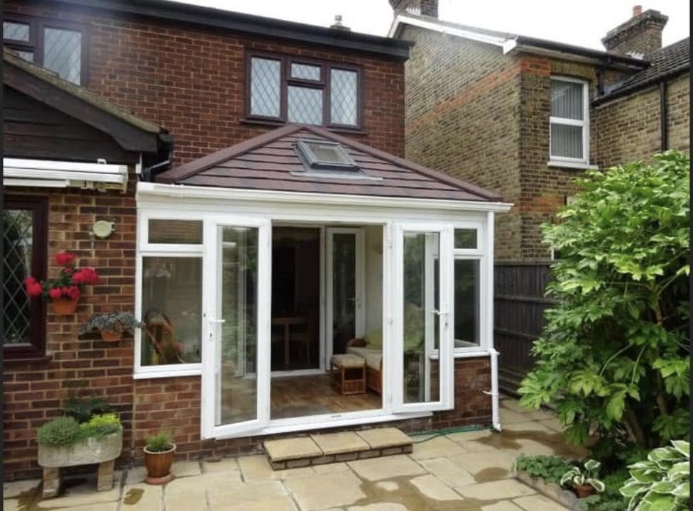Gable end conservatory with pitched tiled roof