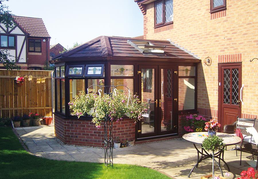 Victorian conservatory with faceted bay and tiled roof