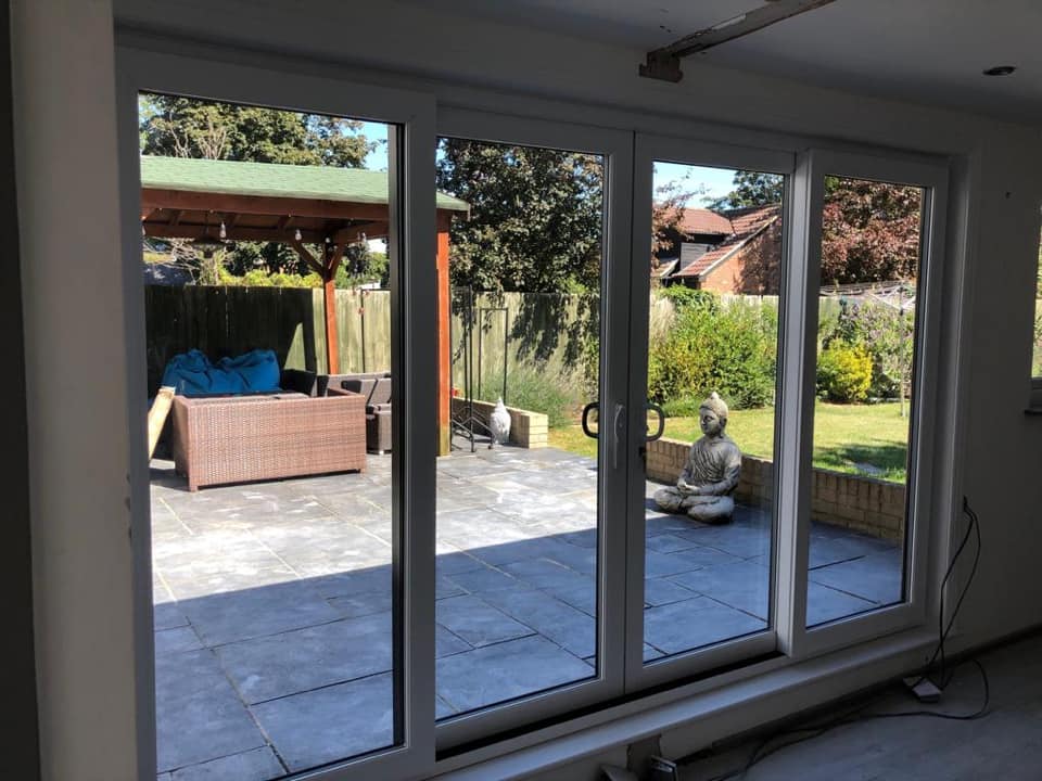 White uPVC sliding patio doors looking out onto a garden